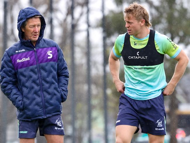 Craig Bellamy talks with Tyran Wishart at training. Picture: Ian Currie