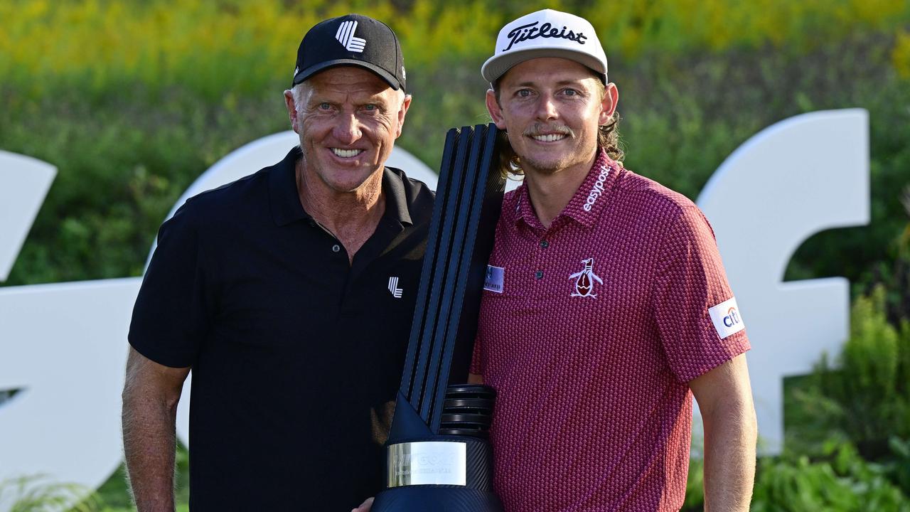 SUGAR GROVE, ILLINOIS - SEPTEMBER 18: Team Captain Cameron Smith of Punch GC poses with Greg Norman, CEO and commissioner of LIV Golf, after winning the individual title during Day Three of the LIV Golf Invitational - Chicago at Rich Harvest Farms on September 18, 2022 in Sugar Grove, Illinois. Quinn Harris/Getty Images/AFP