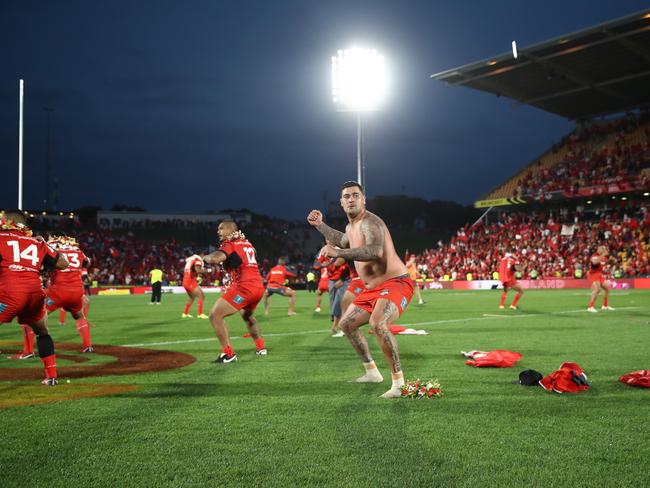 Andrew Fifita performs a cultural challenge after the game.