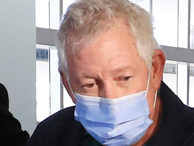 James Blake Blee is escorted through the Cairns domestic airport terminal by Queensland Police officers and detectives to be extradited to New South Wales. He has been charged with importing large commercial quantities of a border controlled drug and a large commercial drug supply. Picture: Brendan Radke