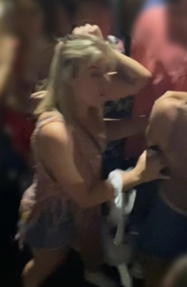 Police have released images od a man and woman following the alleged assault of a police officer in Surry Hills last month. Picture: NSW Police