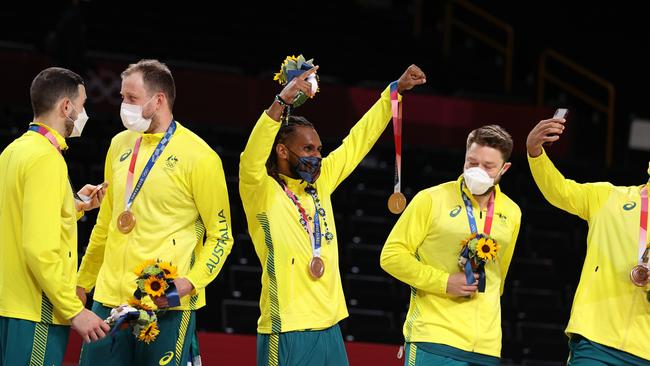 Patty Mills and Australia with their bronze medals. Picture: Gregory Shamus/Getty