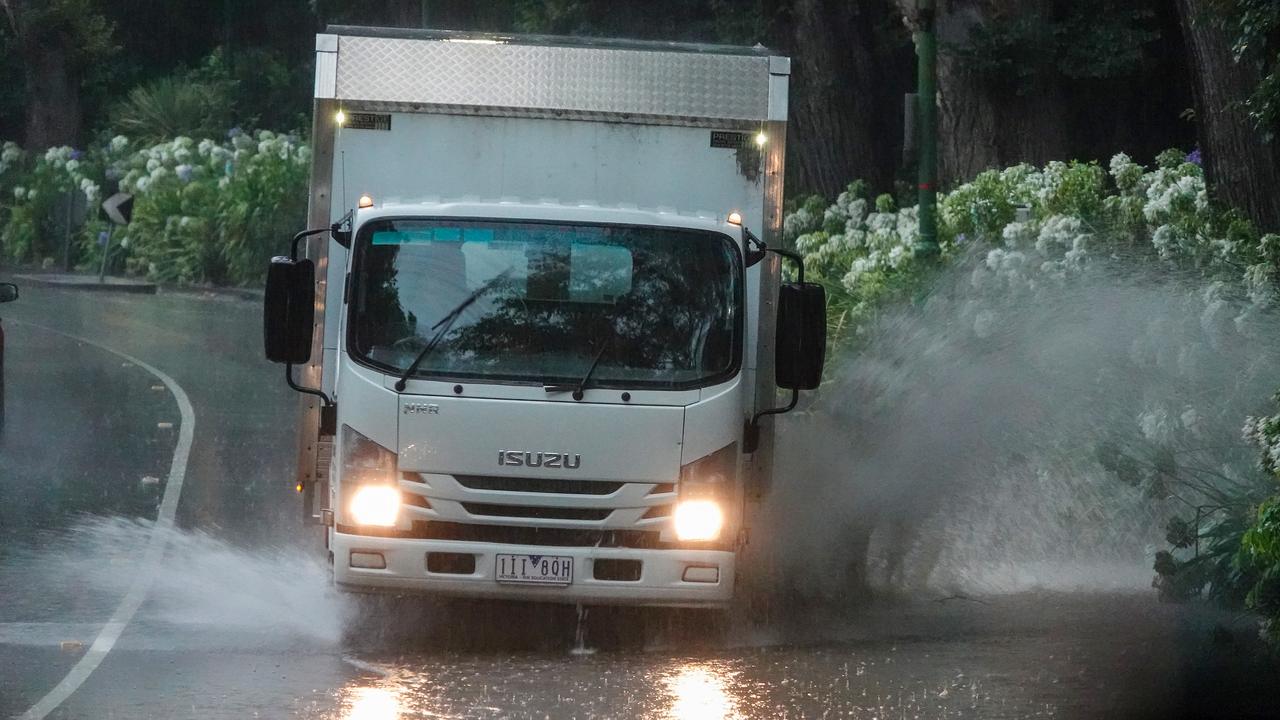 Flooding along Alexandra Parade in Melbourne on Friday. Picture: Alex Coppel.