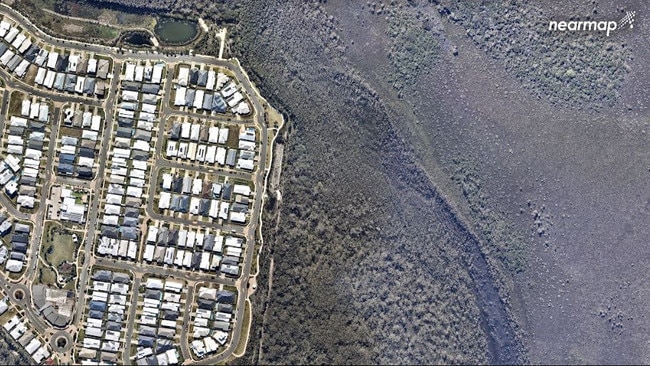 Peregian taken from the air in July, ahead of the September 9 bushfires that would have destroyed the town if not for the efforts of rural and urban firefighters rushed onto the fire ground in the late afternoon of September 9.