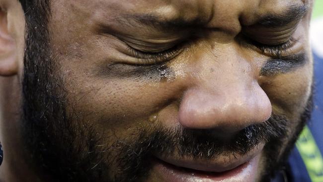 Wilson cries after overtime.