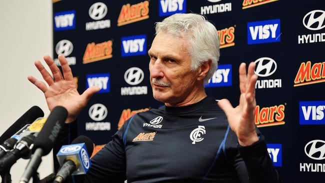 Mick Malthouse has broken bread with media adversary Mark Stevens.