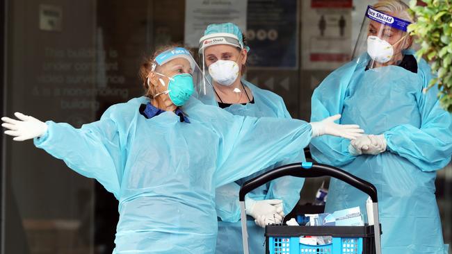 A Covid testing team arrives at the Arcare aged-care facility in Maidstone, in Melbourne’s northwest, on Monday. Picture: David Crosling