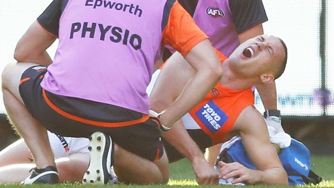 Tom Scully screams in pain after breaking his ankle against the Magpies. Picture: Getty Images