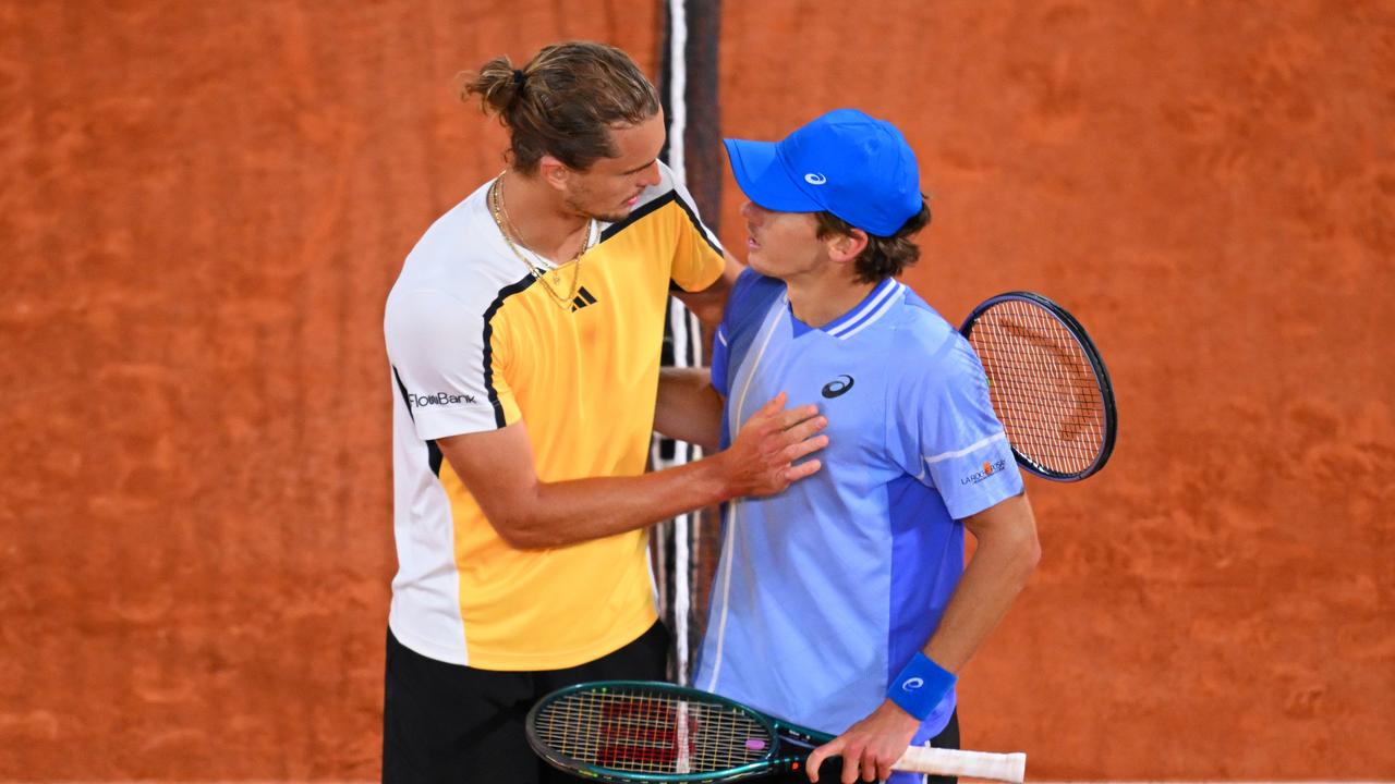 Alexander Zverev of Germany embraces Alex De Minaur of Australia at the net after their match. Picture: Getty Images