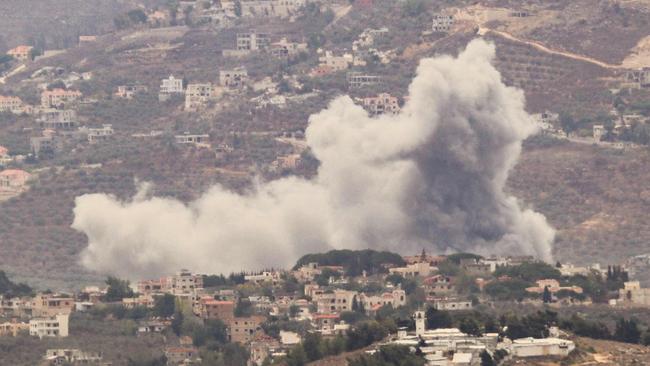 Smoke billows from the site of an Israeli air strike on Lebanon's southern village of Kfar Kila. Picture: Rabih Daher / AFP