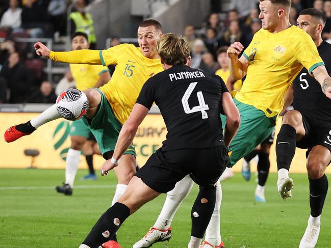 BRENTFORD, ENGLAND - OCTOBER 17: Mitchell Duke of Australia scores the team's first goal during the Trans-Tasman Trophy international friendly match between Australia Subway Socceroos and New Zealand All Whites at Gtech Community Stadium on October 17, 2023 in Brentford, England. (Photo by Ryan Pierse/Getty Images)