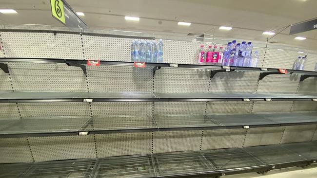 In a post on X, 6 News Australia chief reporter Roman Mackinnon said ‘this water aisle was full 24 hrs ago’. Picture: Supplied / X @RomanMackinnon6