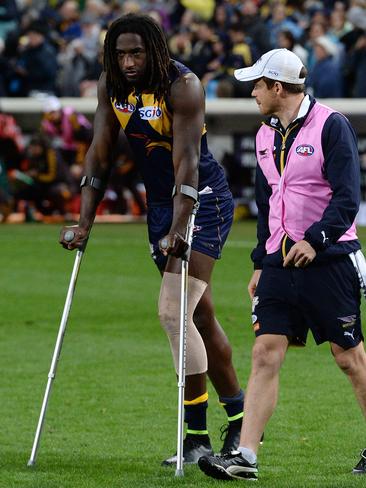 Naitanui leaves the field on crutches after the Eagles’ win. Picture: Daniel Wilkins