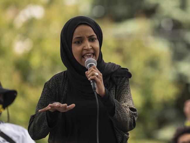 Hard left politician Ilhan Omar speaks to a crowd gathered for a march to defund the Minneapolis Police Department. Picture: AFP