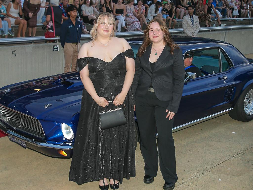 Charlotte Durnell and Tema White at the Red Carpet arrivals at Sea World for the Pimpama SHS Formal 2023. Picture: Glenn Campbell