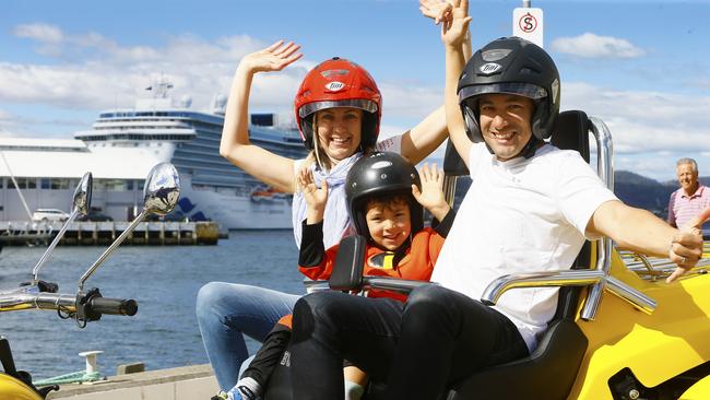 Triple-header: Miranda, Blake and Mark Packer of Nowra, NSW enjoy a ride on Hobart’s Trike Mania Adventure Tour in happier times. Picture: Matt Thompson