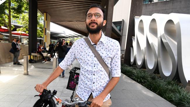 Brisbane city councillor Jonathan Sri leaves the Magistrates Court in Brisbane yesterday. Sri has successfully fought a ban on an environmental protest issued by Lord Mayor Adrian Schrinner. Picture: AAP Image/Dan Peled.