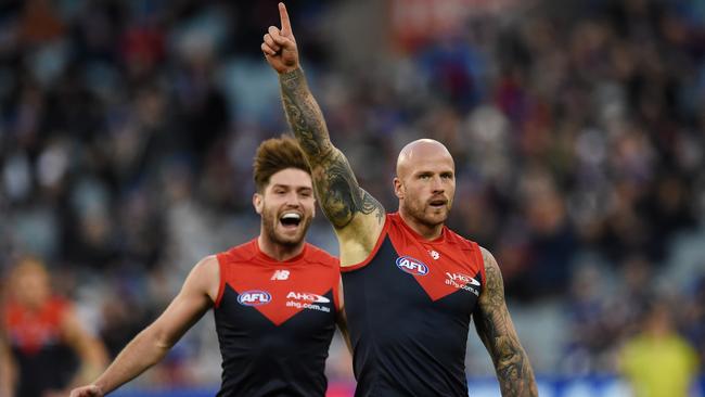 Nathan Jones of the Demons celebrates after kicking a goal. (AAP Image/Tracey Nearmy)