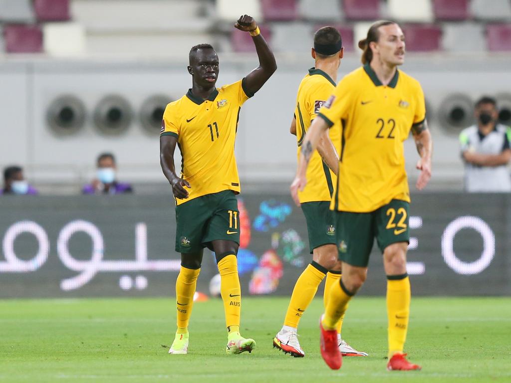 Awer Mabil celebrates after scoring for Australia against China in September. Picture: Mohamed Farag / Getty Images