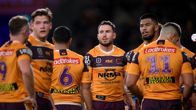 Darius Boyd of the Broncos (centre) and teammates react after conceding a try during the Round 14 NRL match between the Parramatta Eels and the Brisbane Broncos at Bankwest Stadium in Sydney, Saturday, June 15, 2019. (AAP Image/Dan Himbrechts) NO ARCHIVING, EDITORIAL USE ONLY