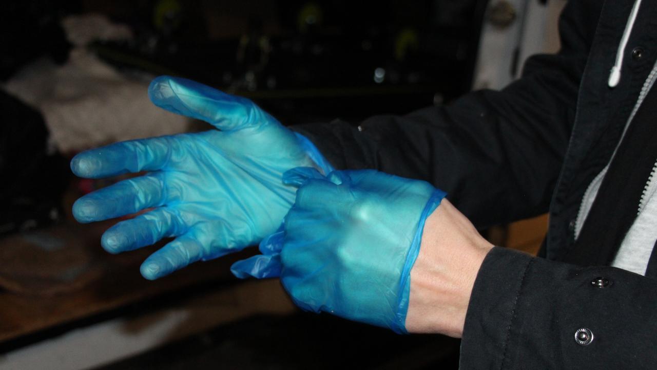 Mr Smith uses gloves to dumpster dive. Picture: News.com.au/ Jessica Wang.