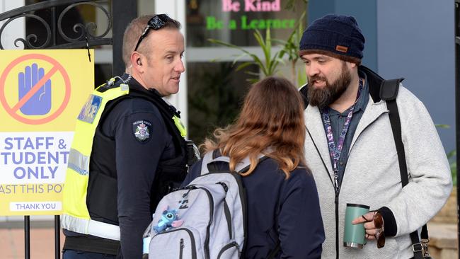 Staff leave Rangebank Primary School after the horror find. Picture: Andrew Henshaw