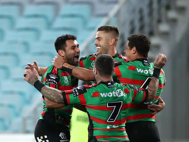 Alex Johnston celebrates with his teammates.