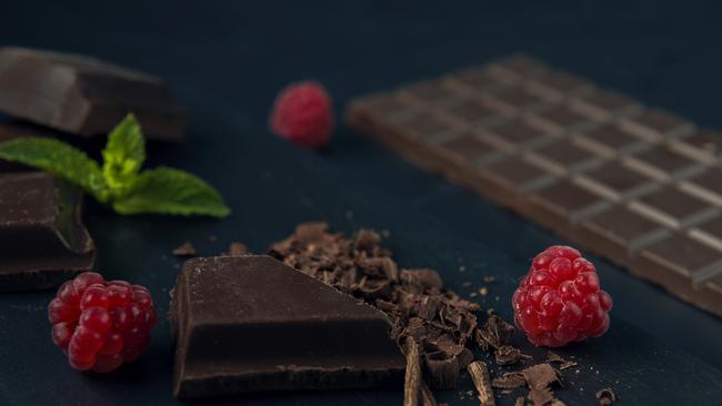 Try dark chocolate and raspberries to help reduce oxidative stress, support heart health, and protect against age-related cellular damage. Picture: iStock