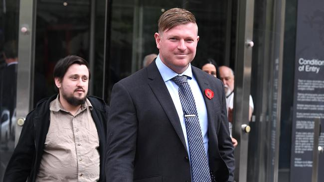 United Patriots Front leader Blair Cottrell (right) leaves the County Court in Melbourne in 2019. Picture: AFP.