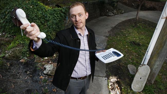 Chris Mills, a doctor based in Doncaster, Victoria, says he has been without a home phone or internet service for five months due to NBN connection delays. Picture: David Caird