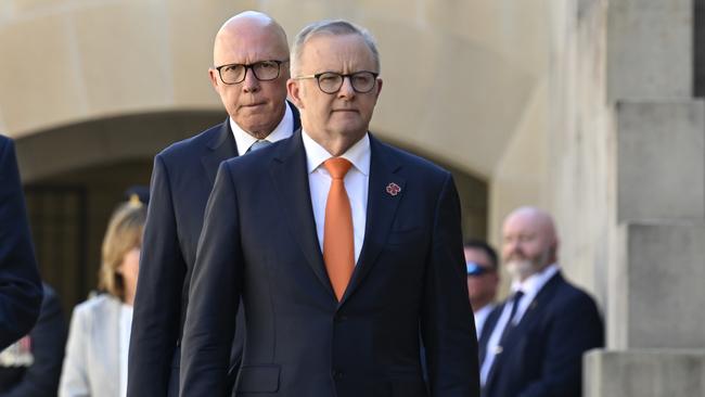 CANBERRA, AUSTRALIA  - NewsWire Photos - February 3, 2025:  Prime Minister Anthony Albanese and Leader of the Opposition Peter Dutton during the last post ceremony at the Australian War Memorial in Canberra. Picture: NewsWire / Martin Ollman