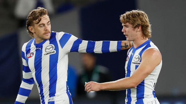 MELBOURNE, AUSTRALIA - JUNE 12: Hugh Greenwood (left) and Jason Horne-Francis of the Kangaroos look on during the 2022 AFL Round 13 match between the North Melbourne Kangaroos and the GWS Giants at Marvel Stadium on June 12, 2022 in Melbourne, Australia. (Photo by Michael Willson/AFL Photos via Getty Images)