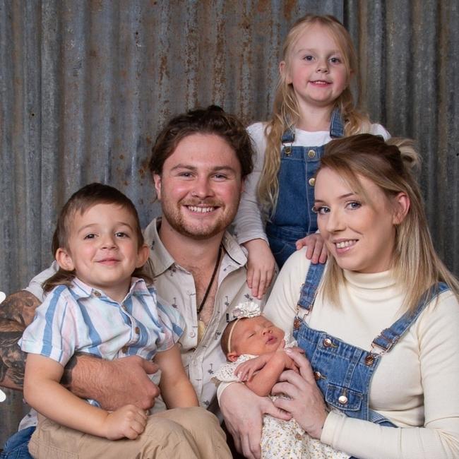 Zoe Lee Buhler with her husband, James, and three children.