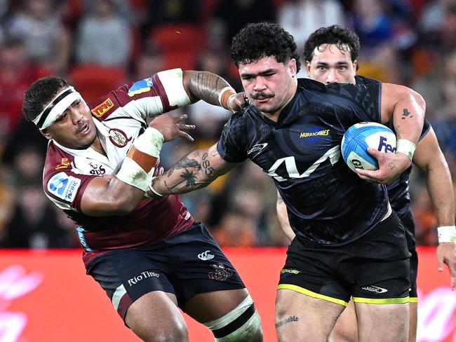 Hurricanes’ Du'Plessis Kirifi breaks away from the Reds defence. Picture: Getty Images