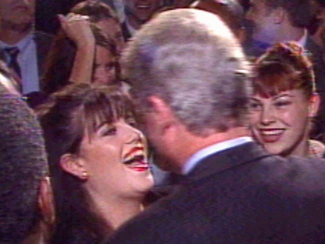 Former White House intern Monica Lewinsky greeting US President Bill Clinton at time of their alleged affair in 1996.