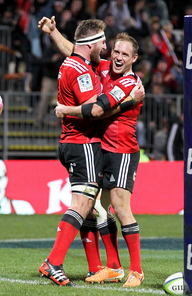 Kieran Read and Andy Ellis celebrate after a try during the Super Ruby semi-final against the Sharks last season.