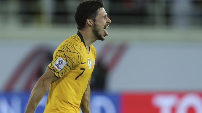 Mathew Leckie’s penalty ensured the Socceroos reached the final eight.