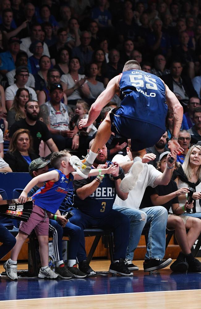 Mitch Creek tried to leap Harry Flourentzou but his foot hits Harry’s son Georgio in the face. Picture: Mark Brake/Getty