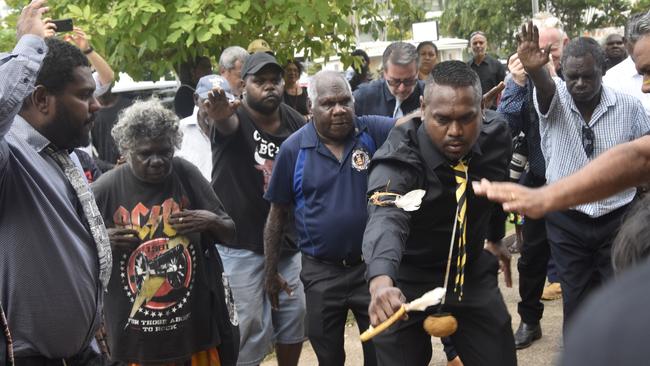 Tiwi dancers sent off the former MLA outside St Mary’s Cathedral. Picture: Sierra Haigh