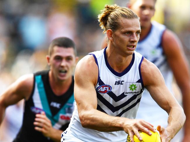 Nat Fyfe of the Dockers during the Round 1 AFL match between the Port Adelaide Power and the Fremantle Dockers at Adelaide Oval in Adelaide, Saturday, March 24, 2018. (AAP Image/David Mariuz) NO ARCHIVING, EDITORIAL USE ONLY