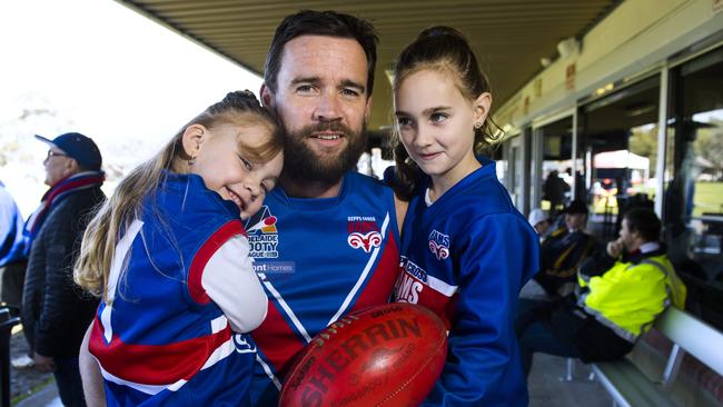 Gepps Cross footballer Leigh Harding with daughters Mia,7, and Ella, 5, before his 450th match for the Rams. Picture: AAP/Mark Brake