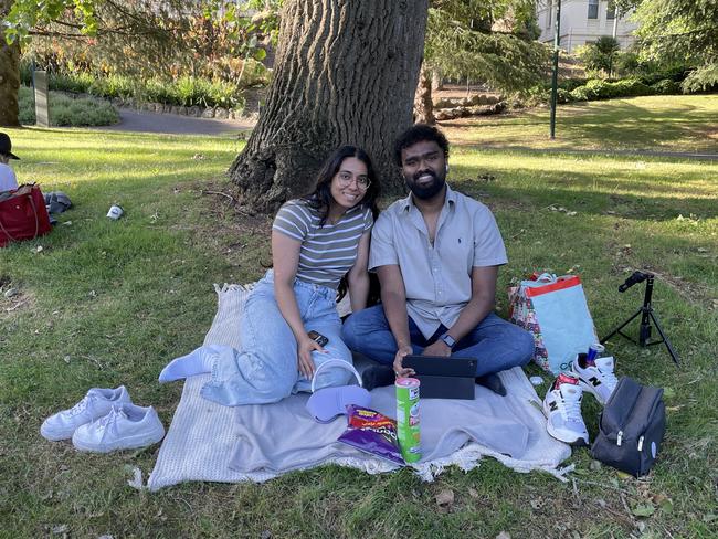 Kavi Liyanage &amp; Vinnie Ganage at Treasury Gardens in the Melbourne CBD for the 2024 New Year's Eve fireworks. Picture: Gemma Scerri