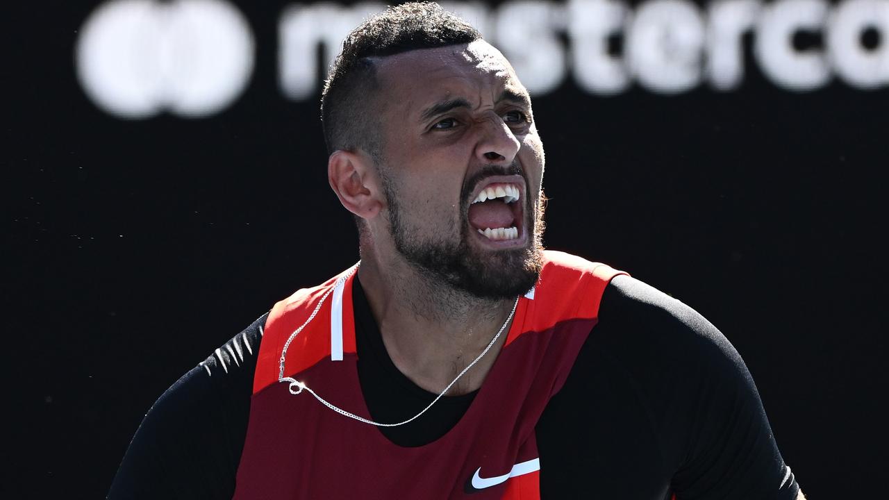 MELBOURNE, AUSTRALIA - JANUARY 25: Nick Kyrgios of Australia interacts with the crowd in his Men's Doubles Quarterfinals match with Thanasi Kokkinakis of Australia against Tim Puetz of Germany and Michael Venus of New Zealand during day nine of the 2022 Australian Open at Melbourne Park on January 25, 2022 in Melbourne, Australia. (Photo by Quinn Rooney/Getty Images)