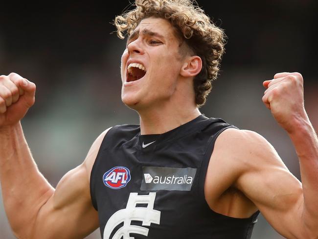 MELBOURNE, AUSTRALIA - AUGUST 05: Charlie Curnow of the Blues celebrates a goal during the 2017 AFL round 20 match between the Essendon Bombers and the Carlton Blues at the Melbourne Cricket Ground on August 05, 2017 in Melbourne, Australia. (Photo by Michael Willson/AFL Media/Getty Images)