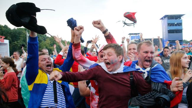 Russia fans react after Russia won / AFP PHOTO / Maxim ZMEYEV