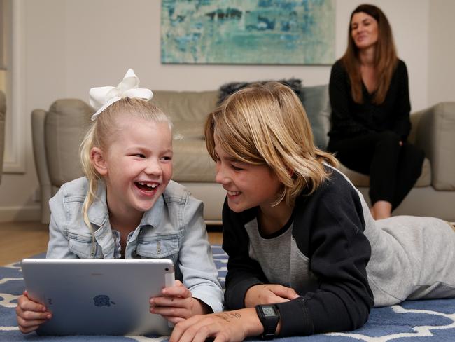 Amanda Roberts is careful to monitor the time daughter Piper and son Wilson enjoy on an iPad. Picture: Nathan Edwards