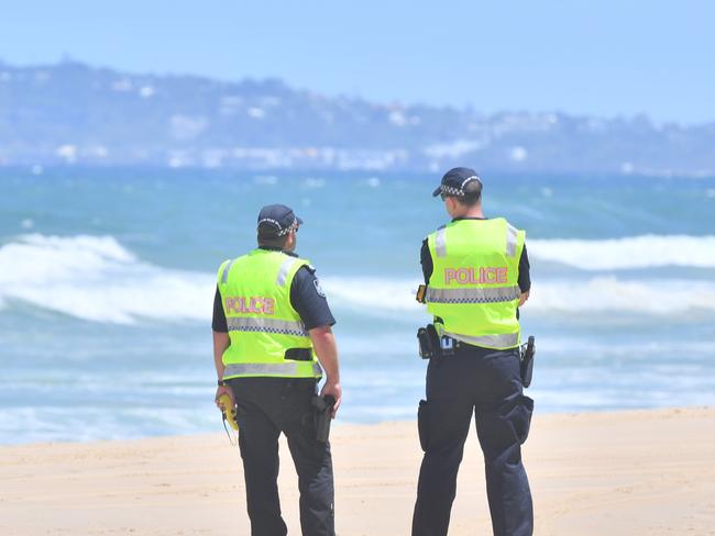 Man allegedly touches himself at popular beach, enters surf naked