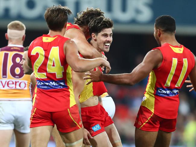 Alex Sexton of the Suns celebrates a goal during the round 22 AFL match between the Gold Coast Suns and Brisbane Lions at Metricon Stadium on August 18, 2018 in Gold Coast, Australia. Picture: Chris Hyde, Getty Images.