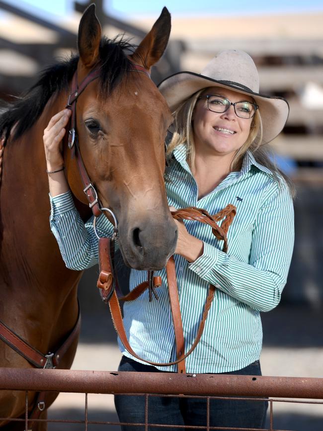 Barossa farmer Megan McLoughlin with her horse Biscuit. Picture: Naomi Jellicoe