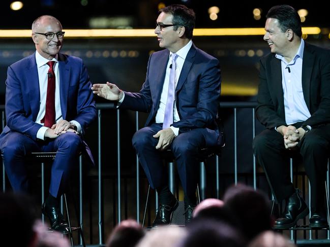 South Australian Premier Jay Weatherill, Opposition Leader Steven Marshall and SA-BEST leader Nick Xenophon react at the South Australian Political leaders debate at the Adelaide Festival Palais, Monday, March 5, 2018. (AAP Image/Morgan Sette) NO ARCHIVING